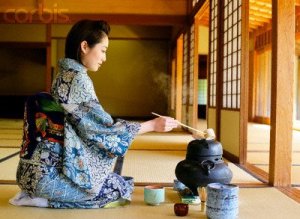 Japanese Woman in a Kimono Making Tea